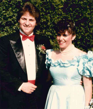 Dr. Berkowitz in a tux next to his wife